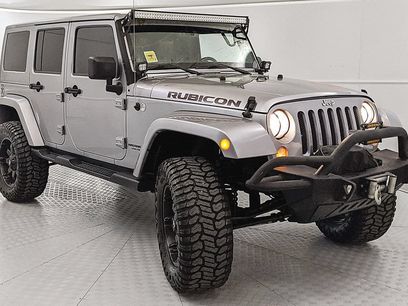 Used 2014 Jeep Wrangler Unlimited Rubicon w/ Dual Top Group