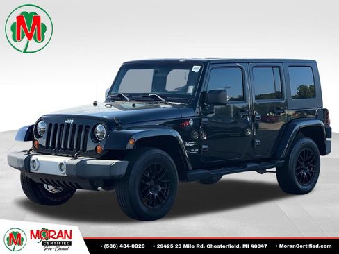 Used 2009 Jeep Wrangler Unlimited Sahara w/ Dual Top Group AWD/4WD image 1
