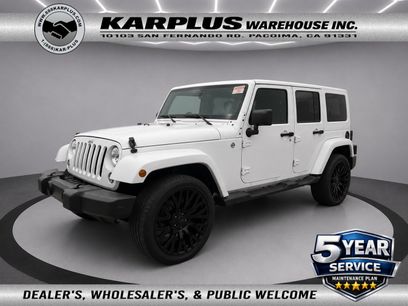 Used 2014 Jeep Wrangler Unlimited Sahara w/ Dual Top Group