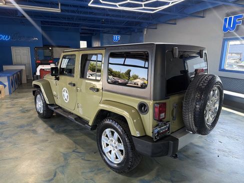 Used 2013 Jeep Wrangler Unlimited Sahara w/ Dual Top Group AWD/4WD image 11