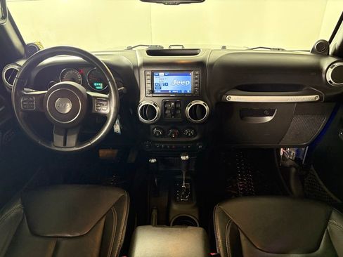 Used 2013 Jeep Wrangler Unlimited Sahara w/ Dual Top Group AWD/4WD image 38