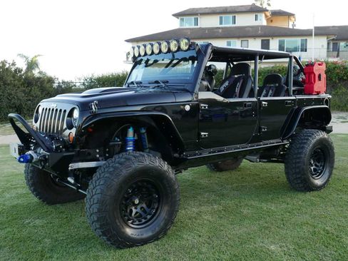 Used 2013 Jeep Wrangler Unlimited Rubicon w/ Dual Top Group image 1