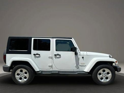 Used 2014 Jeep Wrangler Unlimited Sahara w/ Dual Top Group AWD/4WD image 4