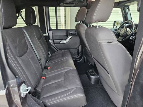 Used 2014 Jeep Wrangler Unlimited Sahara w/ Dual Top Group image 11