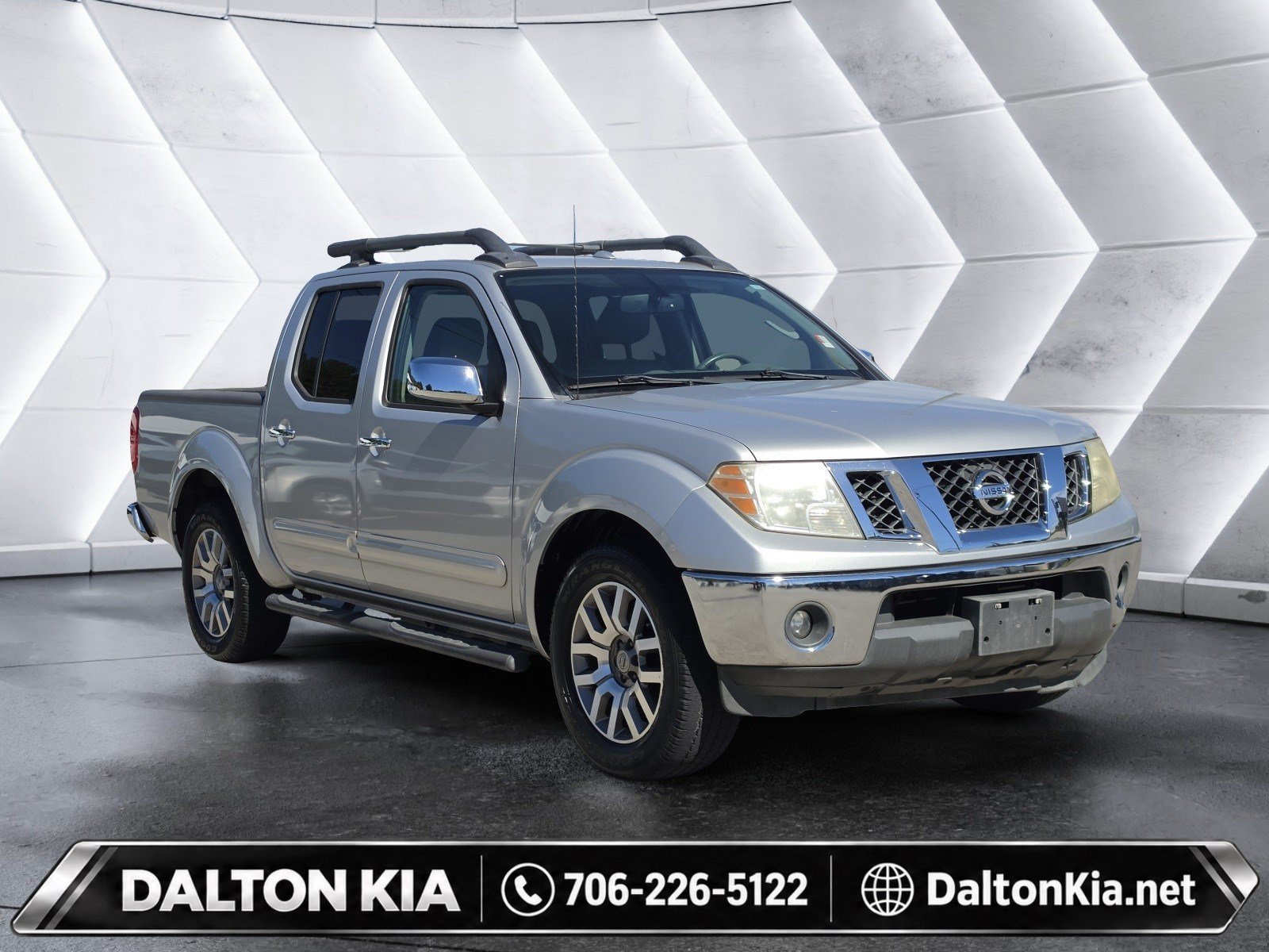 Used 2011 Nissan Frontier SL RWD image 1