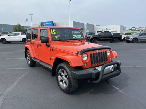 Used 2015 Jeep Wrangler Unlimited Sahara w/ Dual Top Group AWD/4WD image 1