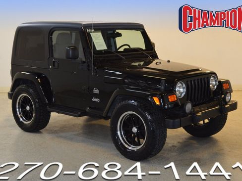 Used 2004 Jeep Wrangler Sahara w/ Dual Top Group AWD/4WD image 1