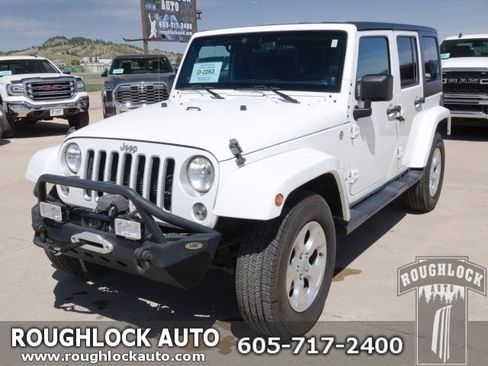 Used 2014 Jeep Wrangler Unlimited Sahara w/ Connectivity Group AWD/4WD image 1