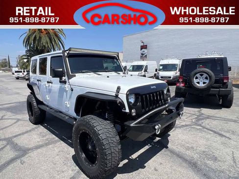 Used 2016 Jeep Wrangler Unlimited Sport w/ Max Tow Package AWD/4WD image 1