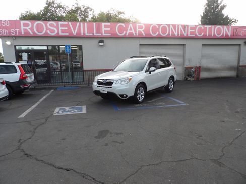 Used 2014 Subaru Forester 2.5i Touring AWD/4WD image 1