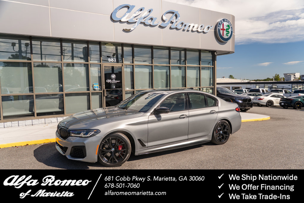Used 2023 BMW M550i xDrive w/ Dynamic Handling Package AWD/4WD image 1