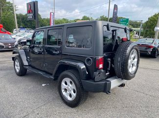 Used 2014 Jeep Wrangler Unlimited Sahara w/ Connectivity Group video 3