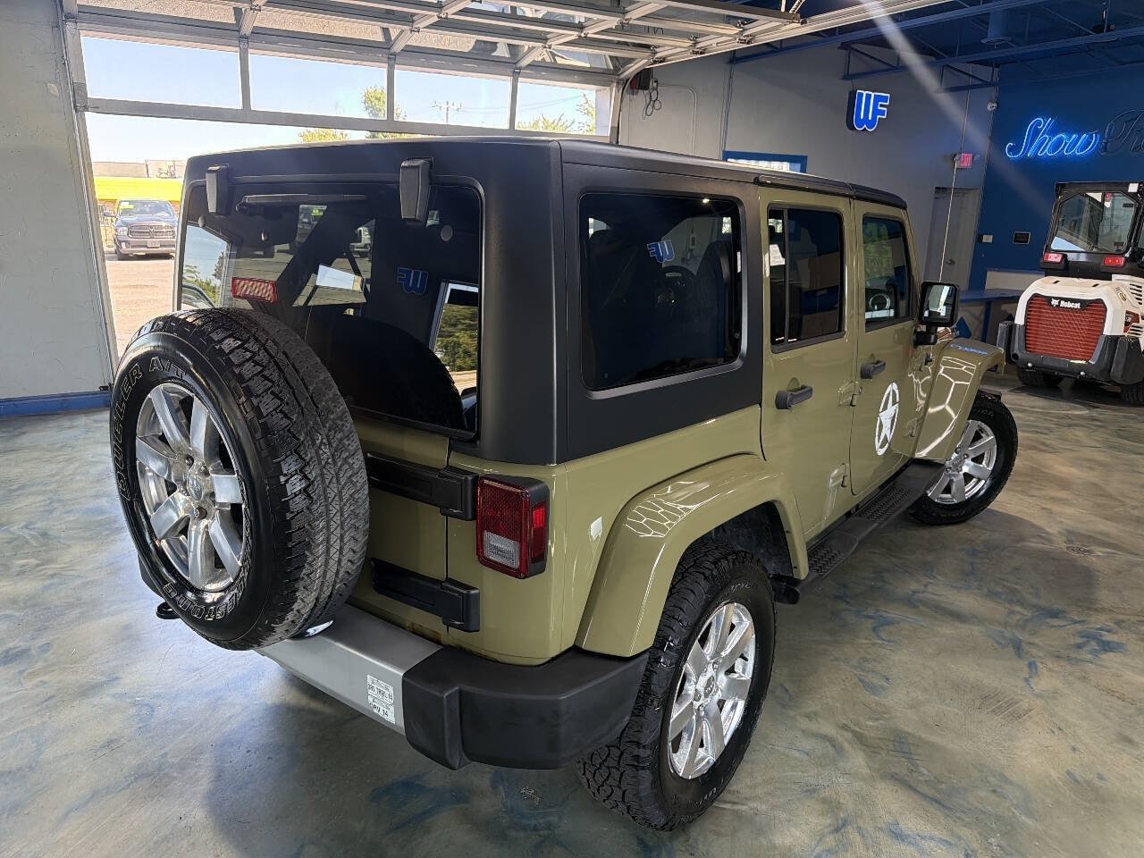 Used 2013 Jeep Wrangler Unlimited Sahara w/ Dual Top Group AWD/4WD image 2