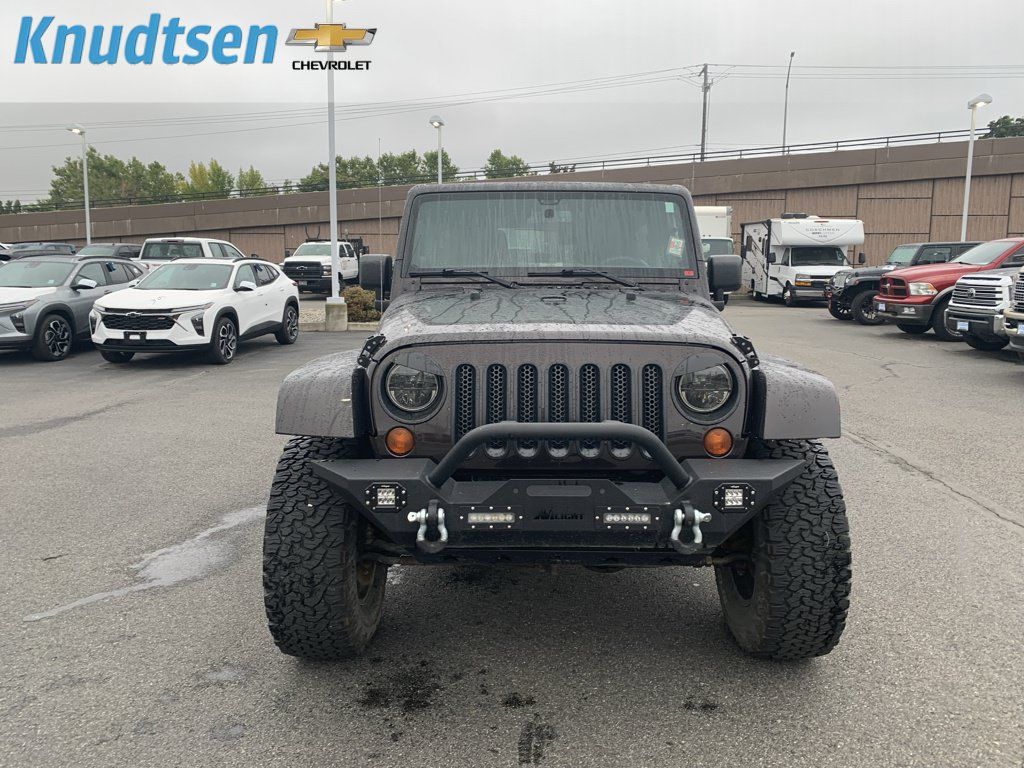 Used 2013 Jeep Wrangler Unlimited Sahara w/ Connectivity Group AWD/4WD image 2