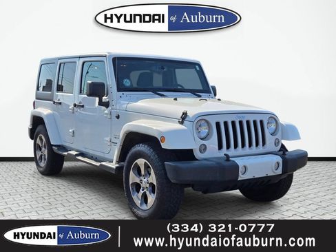 Used 2016 Jeep Wrangler Unlimited Sahara w/ Max Tow Package AWD/4WD image 1