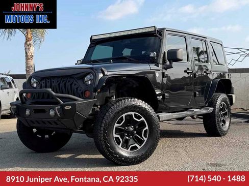 Used 2013 Jeep Wrangler Unlimited Sahara w/ Connectivity Group AWD/4WD image 1