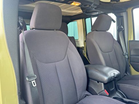 Used 2013 Jeep Wrangler Unlimited Sport w/ Mopar Black Appearance Group image 29