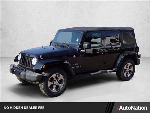 Used 2016 Jeep Wrangler Unlimited Sahara AWD/4WD image 1