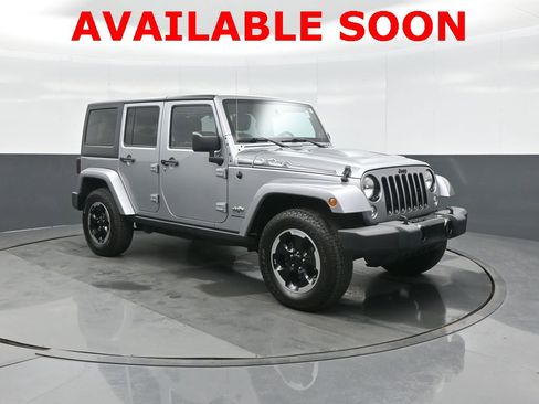 Used 2014 Jeep Wrangler Unlimited Sahara image 1