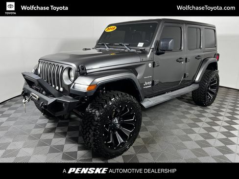 Used 2019 Jeep Wrangler Unlimited Sahara w/ Uconnect 4C Nav & Sound Group AWD/4WD image 1