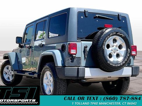 Used 2014 Jeep Wrangler Unlimited Sahara w/ Dual Top Group AWD/4WD image 11