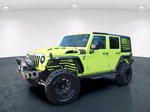 Used 2016 Jeep Wrangler Unlimited Sahara w/ Dual Top Group AWD/4WD image 2