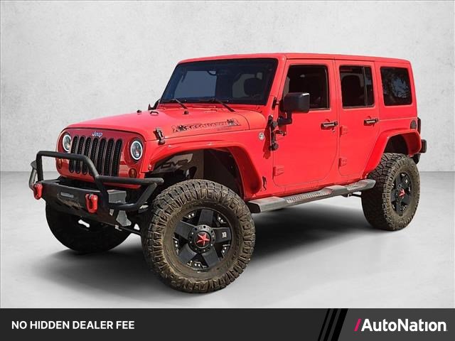 Used 2013 Jeep Wrangler Unlimited Sahara w/ Dual Top Group AWD/4WD image 1