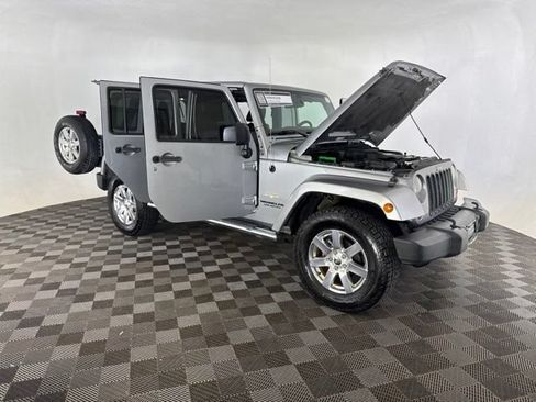 Used 2013 Jeep Wrangler Unlimited Sahara w/ Mopar Chrome Edition Group AWD/4WD image 12
