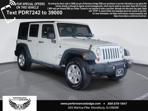 Used 2012 Jeep Wrangler Unlimited Sport AWD/4WD image 1
