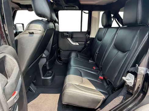Used 2013 Jeep Wrangler Unlimited Rubicon w/ Dual Top Group AWD/4WD image 12