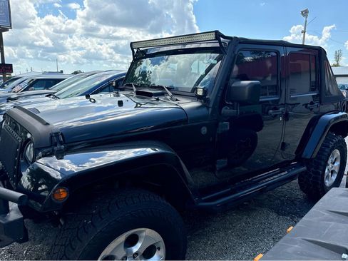 Used 2013 Jeep Wrangler Unlimited Sahara w/ Trailer Tow Group AWD/4WD image 2