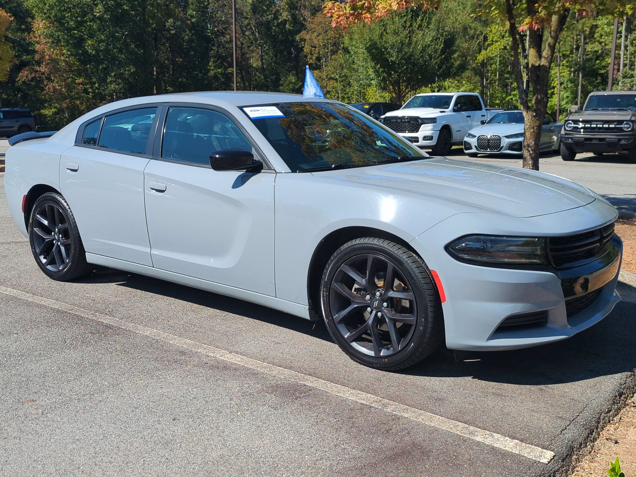 Used 2021 Dodge Charger SXT w/ Blacktop Package RWD image 2