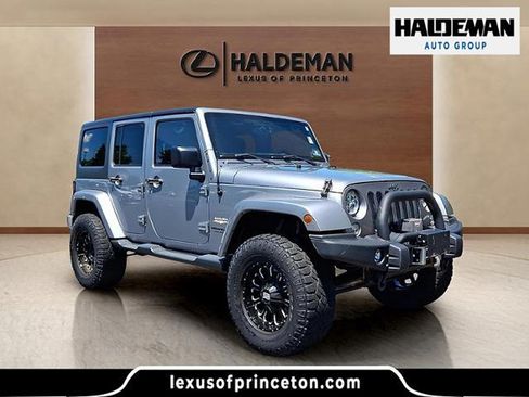Used 2015 Jeep Wrangler Unlimited Sahara w/ Connectivity Group AWD/4WD image 1
