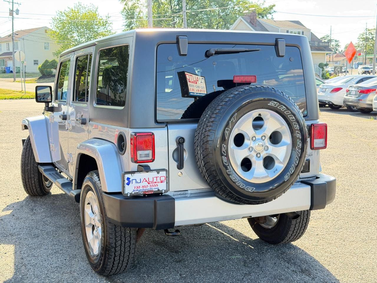 Used 2015 Jeep Wrangler Unlimited Sahara w/ Dual Top Group AWD/4WD image 76