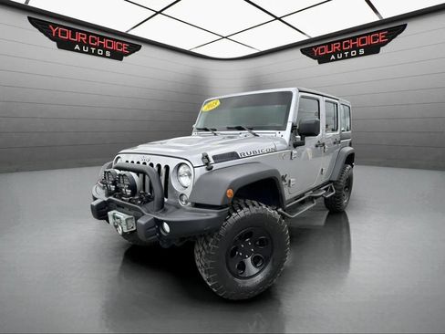 Used 2015 Jeep Wrangler Unlimited Rubicon w/ Dual Top Group AWD/4WD image 1