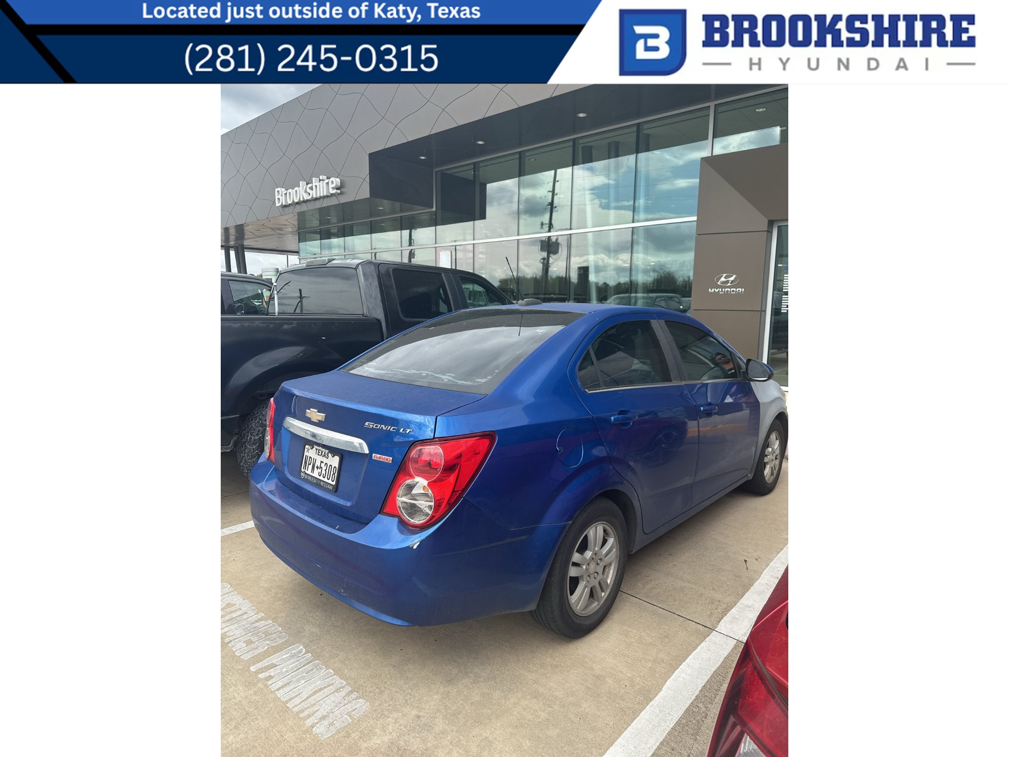 Used 2016 Chevrolet Sonic LT FWD image 1