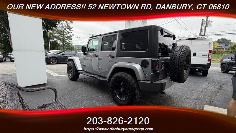 Used 2014 Jeep Wrangler Unlimited Sahara w/ Dual Top Group AWD/4WD image 3