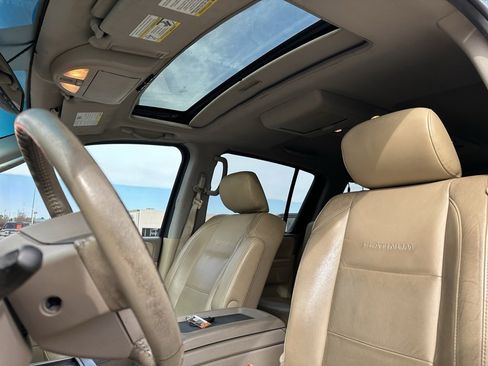 Used 2011 Nissan Armada Platinum w/ 2nd Row Captain Seat Pkg image 16