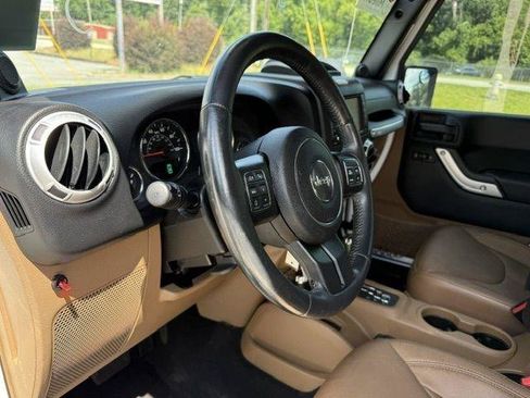 Used 2013 Jeep Wrangler Unlimited Sahara w/ Dual Top Group AWD/4WD image 15