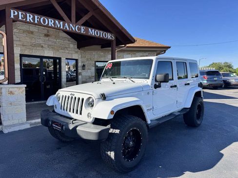 Used 2014 Jeep Wrangler Unlimited Sahara w/ Connectivity Group AWD/4WD image 1