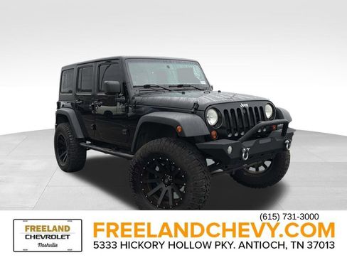 Used 2012 Jeep Wrangler Unlimited Sport image 1