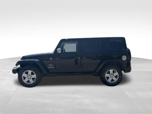 Used 2012 Jeep Wrangler Unlimited Sahara w/ Dual Top Group AWD/4WD image 6