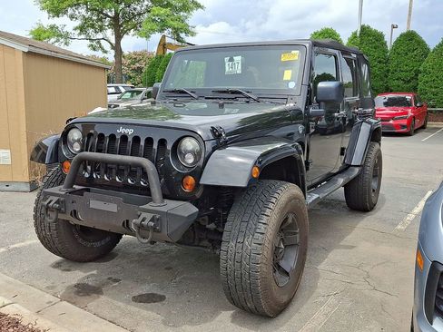 Used 2013 Jeep Wrangler Unlimited Sahara w/ Connectivity Group AWD/4WD image 1