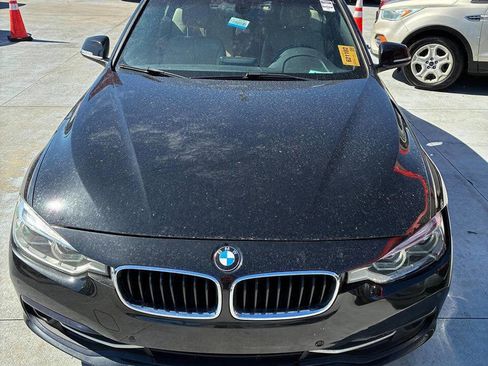 Used 2017 BMW 330i Sedan w/ Premium Package image 1