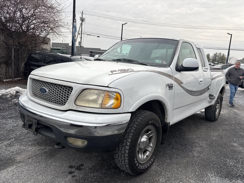 Used 1999 Ford F150 XLT AWD/4WD image 1