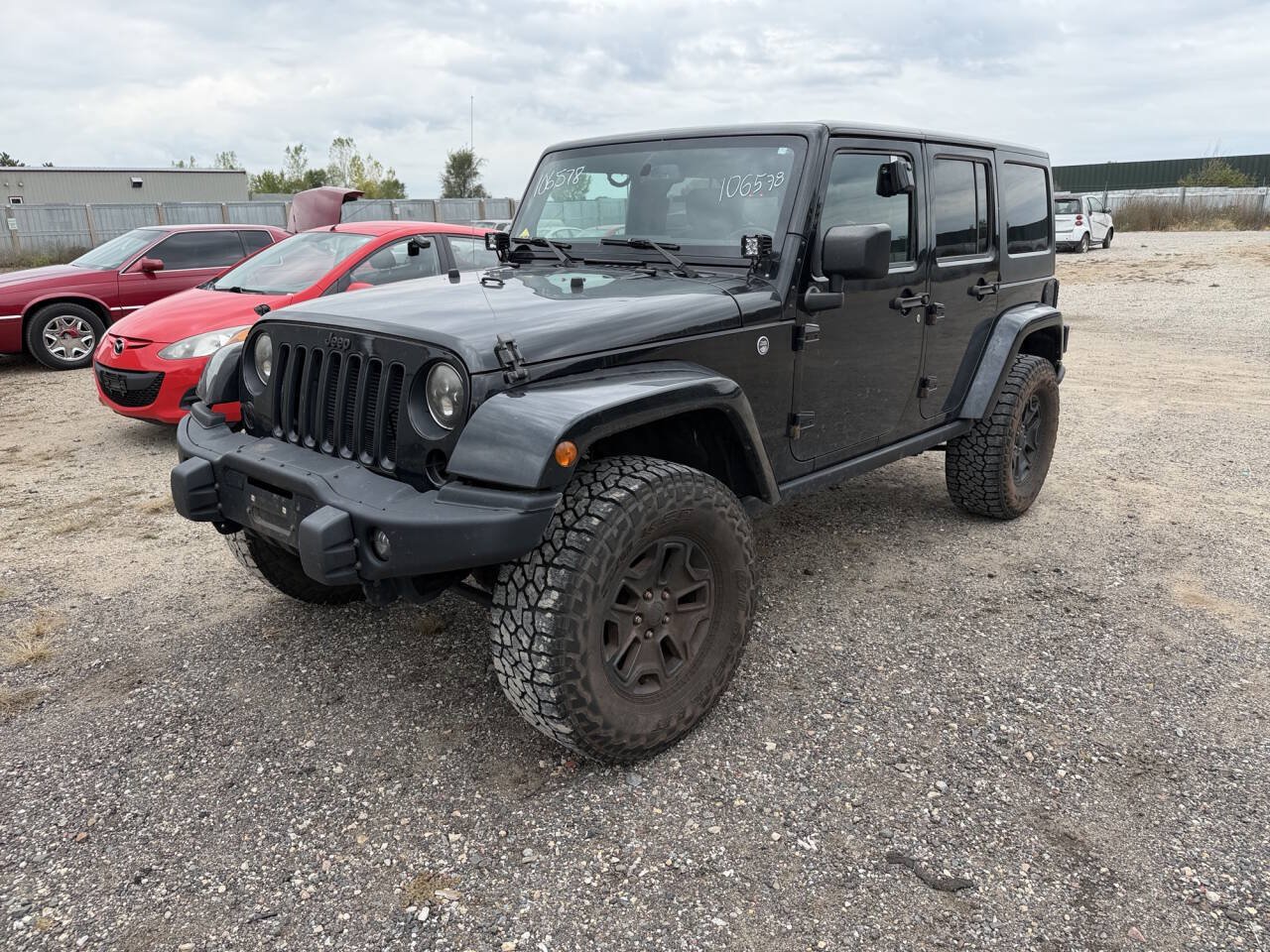 Used 2016 Jeep Wrangler Unlimited Sahara AWD/4WD image 1