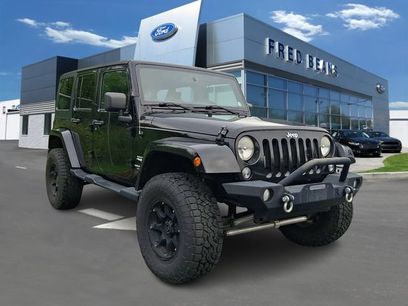 Used 2014 Jeep Wrangler Unlimited Sahara w/ Dual Top Group