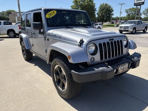 Used 2014 Jeep Wrangler Unlimited Sahara AWD/4WD image 1
