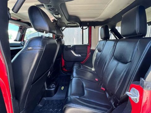 Used 2013 Jeep Wrangler Unlimited Sahara w/ Dual Top Group AWD/4WD image 10