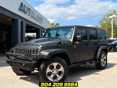 Used 2017 Jeep Wrangler Unlimited Sahara w/ Dual Top Group AWD/4WD image 1